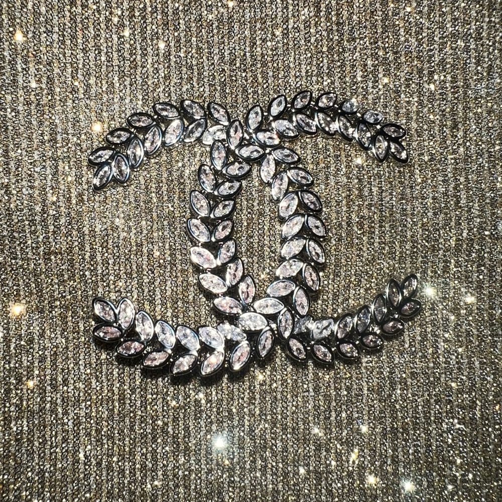 Elegant Stamped Silver and Black Crystal Brooch
